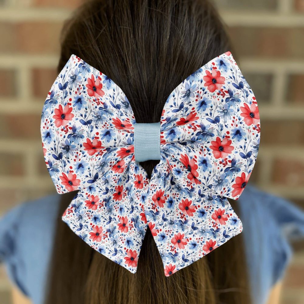 Floral hair bow on brown hair