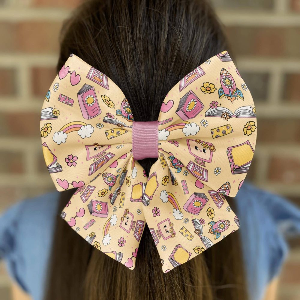 Colorful hair bow with cute cartoon patterns.