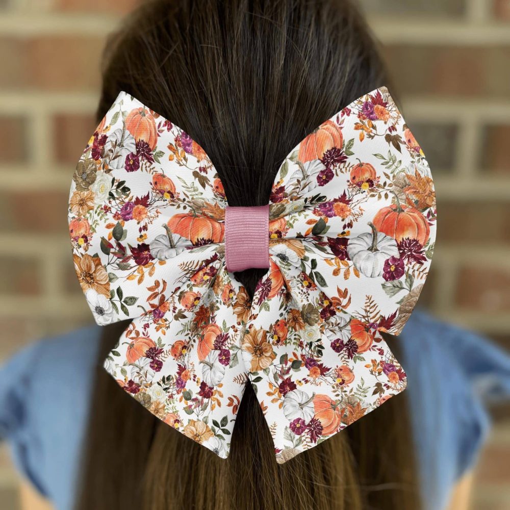 Large floral bow in brown hair