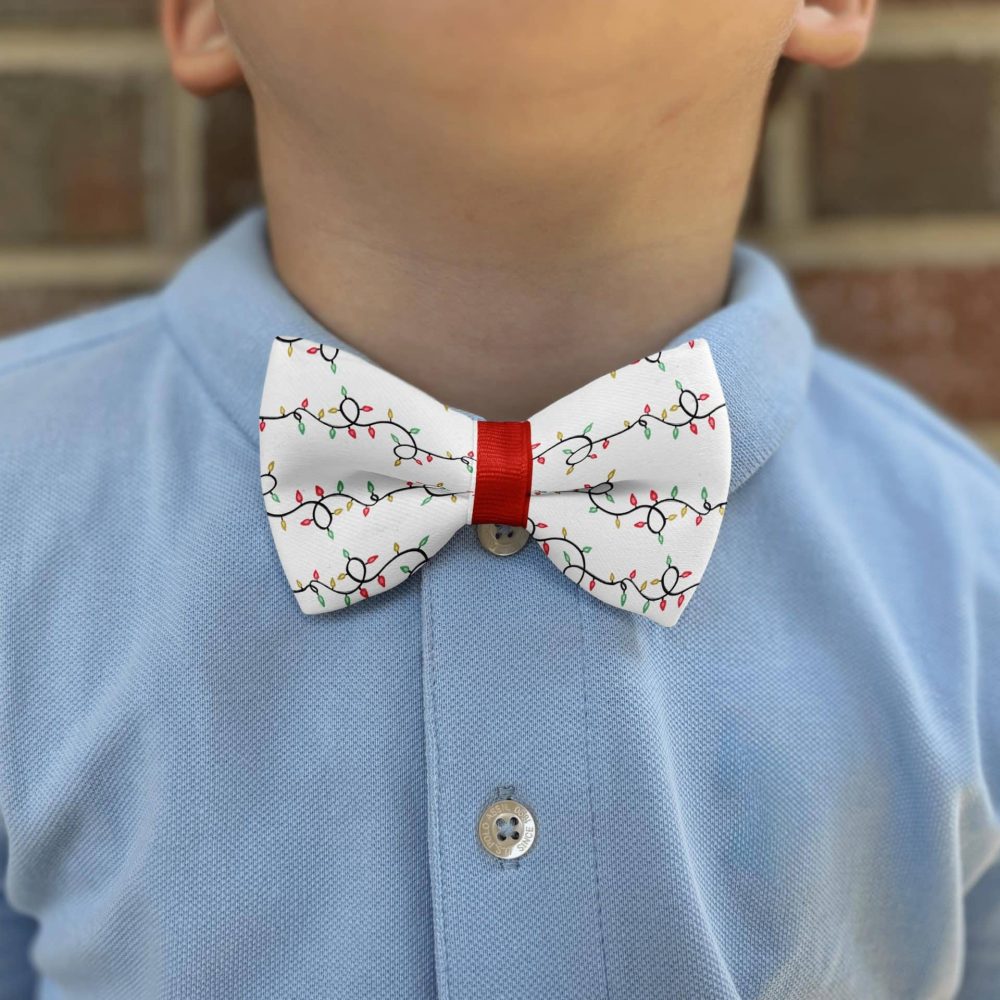 Child with festive bow tie and blue shirt