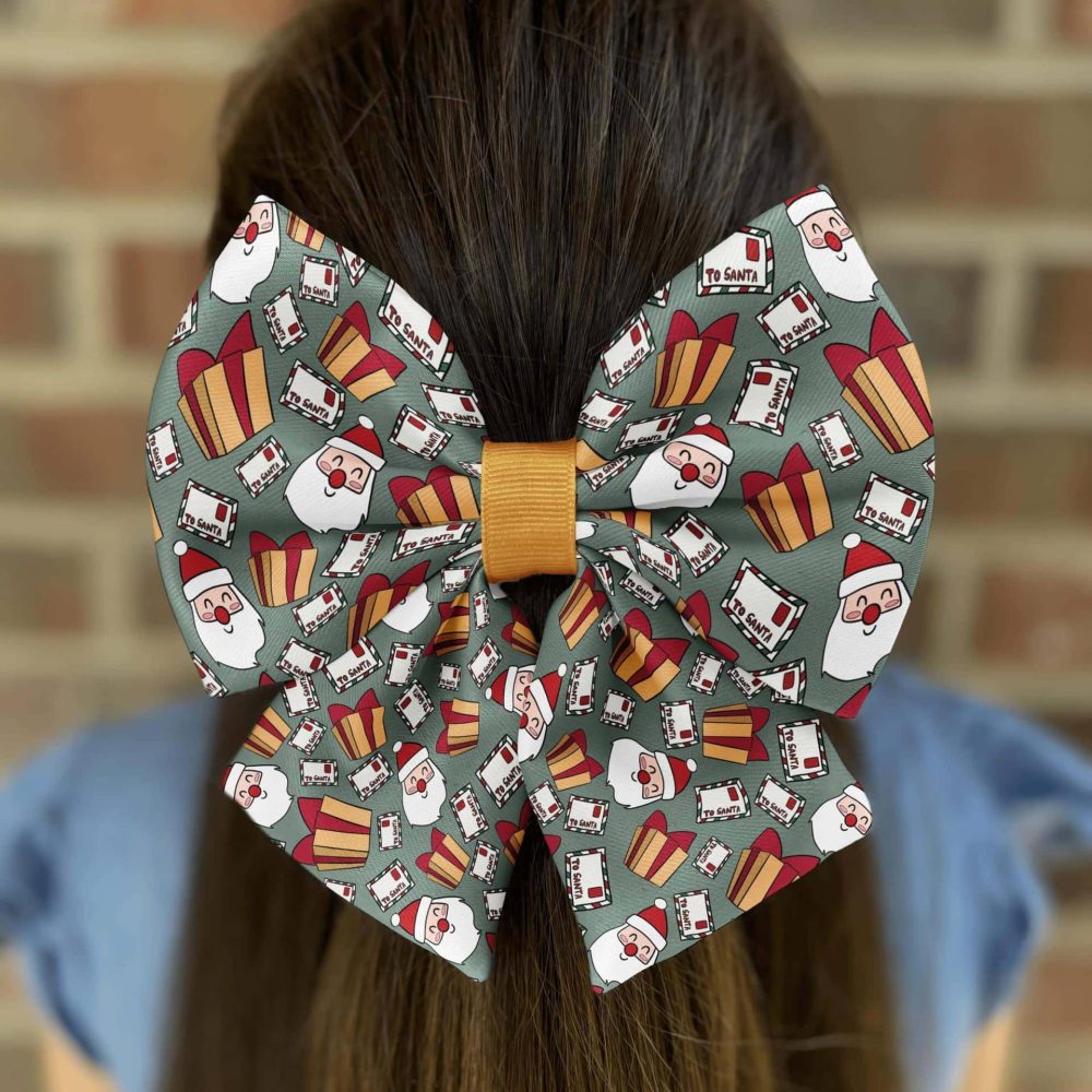 Christmas-themed hair bow with Santa design
